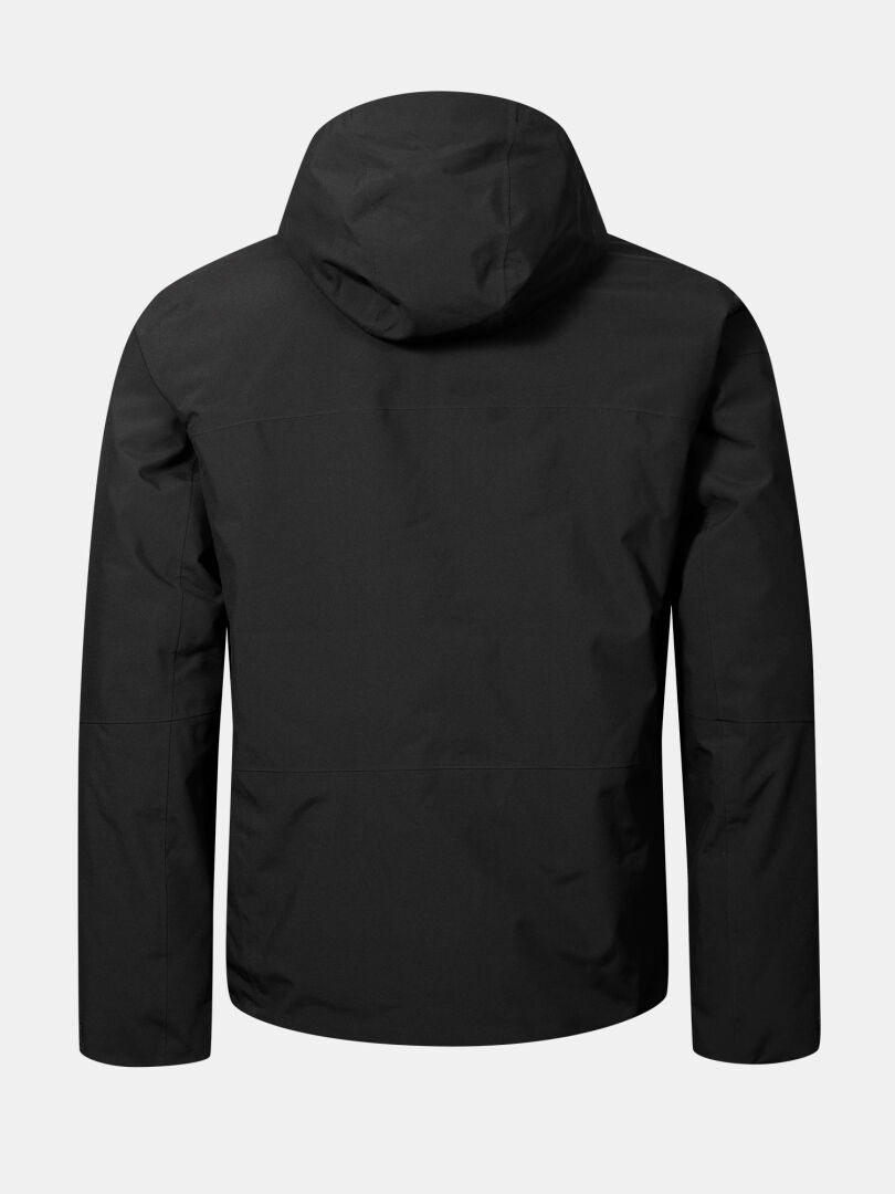 Eine schwarze Halti Melvik DX Skijacke Herren wird von hinten auf einem schlichten hellgrauen Hintergrund gezeigt.