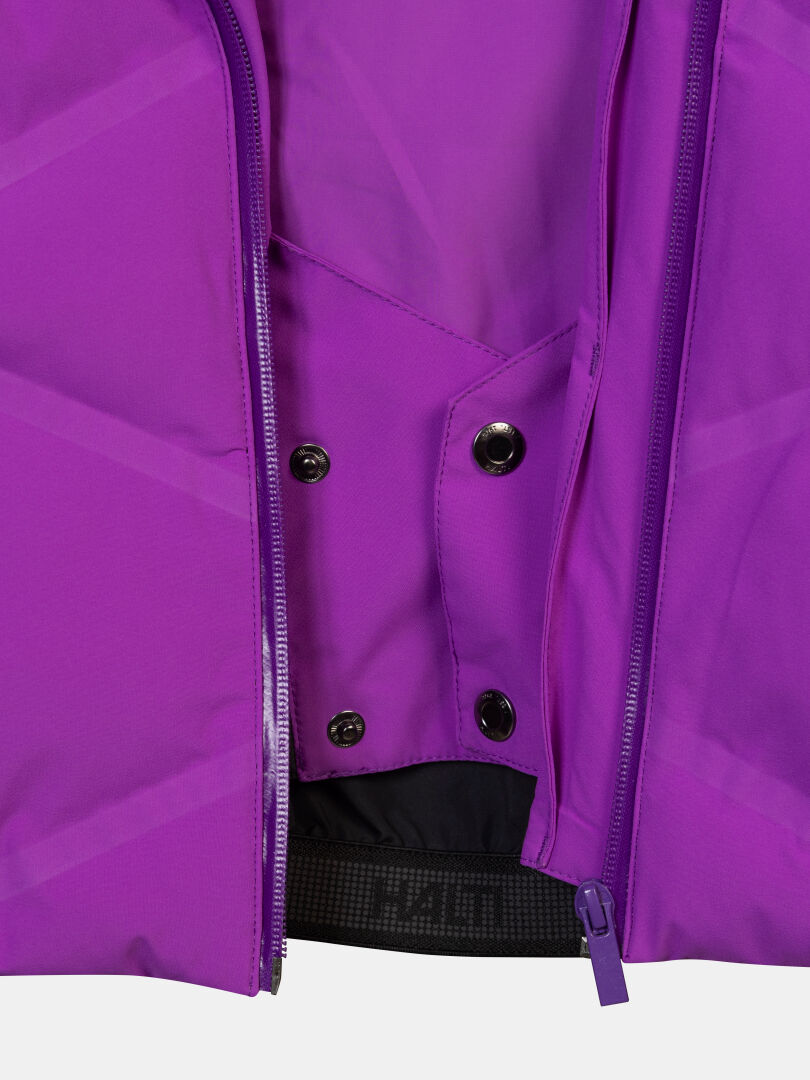 Nahaufnahme der Halti Nordic Arcty II Damen-Skijacke mit Reißverschluss, Druckknöpfen und elastischem Saum.