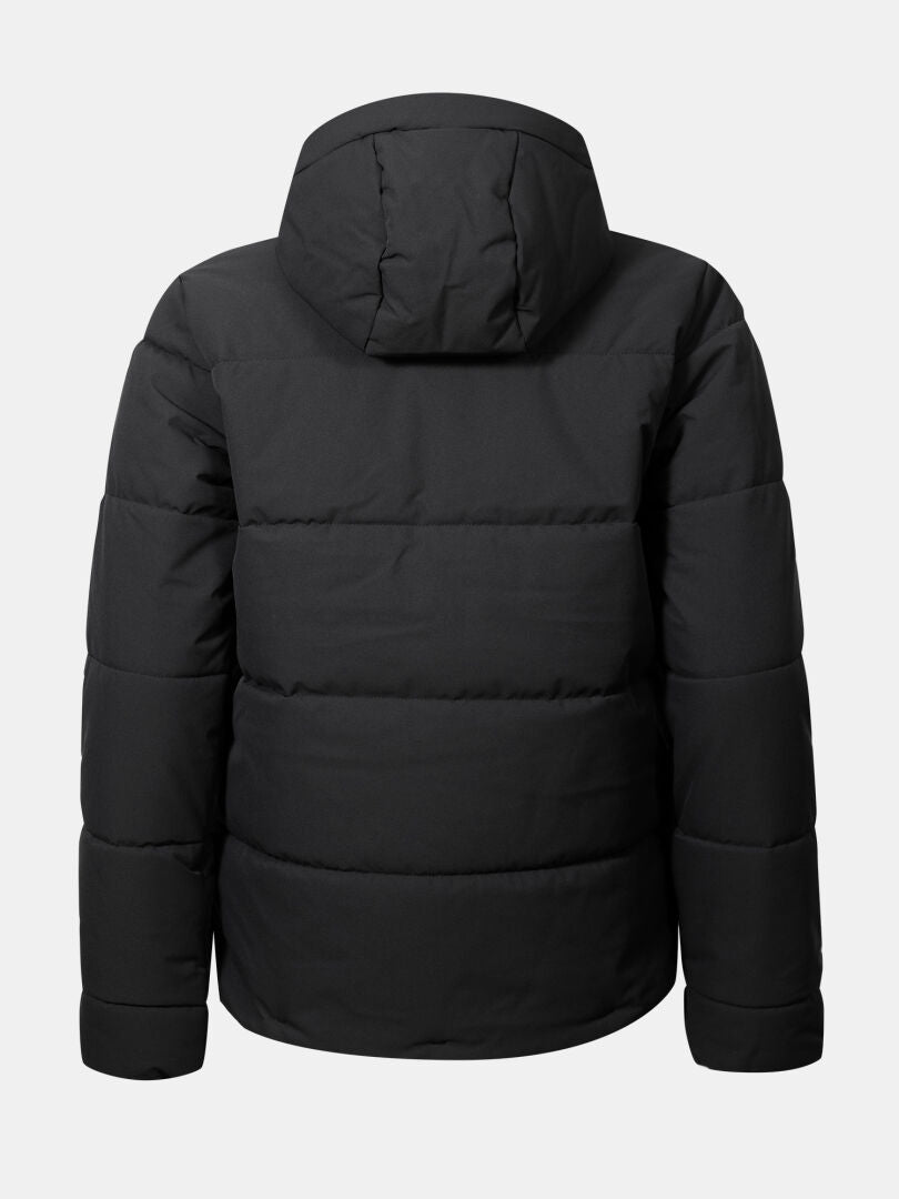 Eine schwarze Halti Ascale Plus Puffer Skijacke Damen mit Kapuze, von hinten auf einem hellgrauen Hintergrund dargestellt.