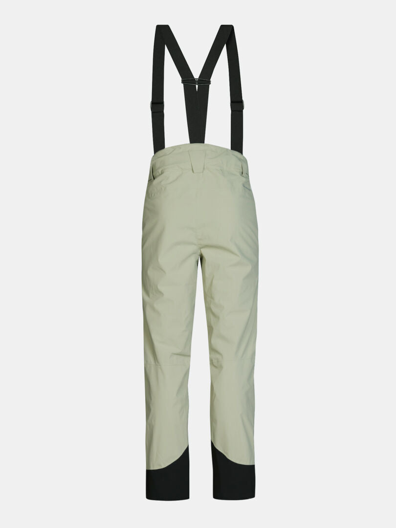 Rückansicht der hellgrünen Skihose Halti Carvey II DX Skihose Herren mit schwarzen Hosenträgern und schwarzen, verstärkten Bündchen.