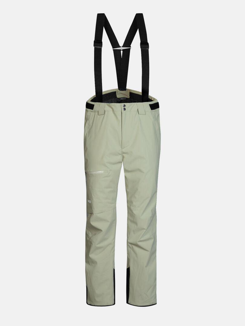 Beigefarbene Halti Carvey II DX Skihose für Herren mit schwarzen Hosenträgern, einer Oberschenkeltasche mit Reißverschluss und Verstärkungen an den Beinen.