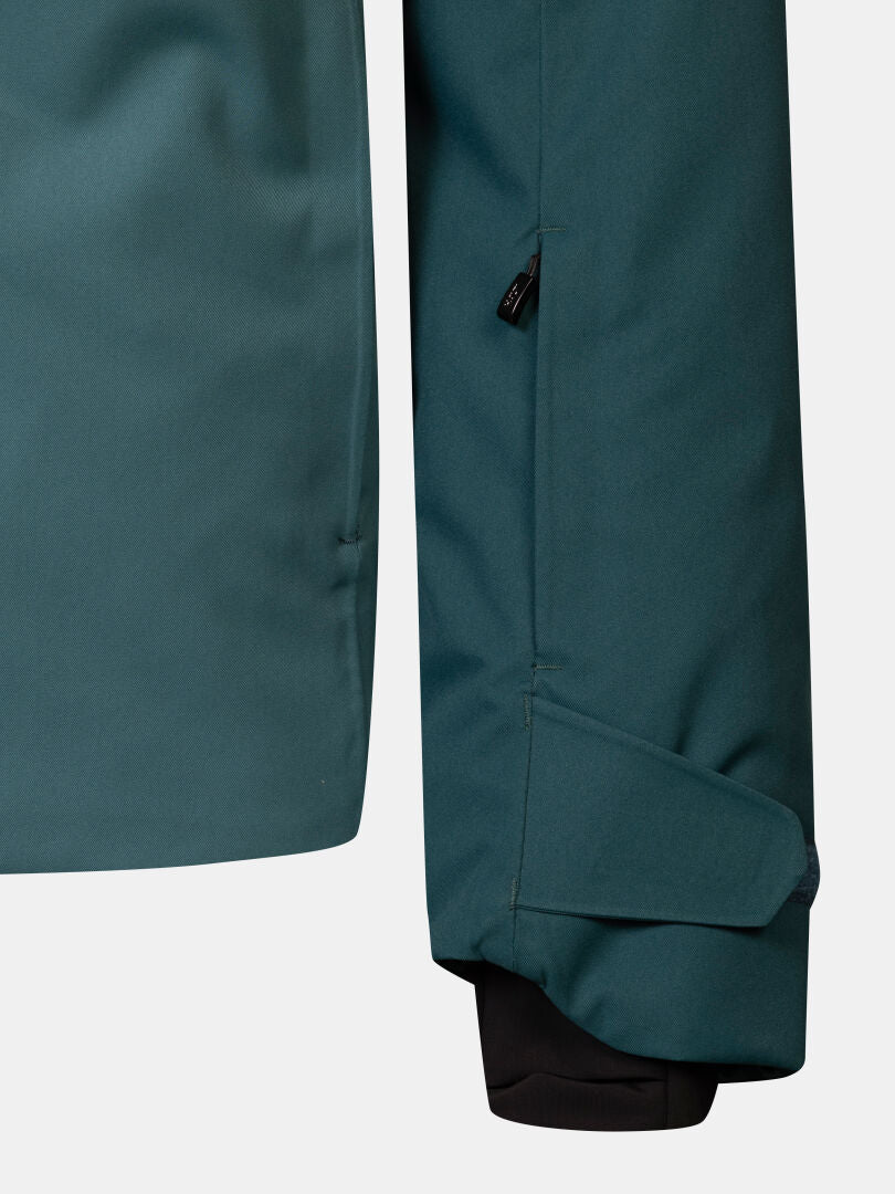 Dunkelblaugrüne Halti Recier DX Skijacke für Herren mit verstellbaren Klettverschluss-Ärmelbündchen und einer kleinen Reißverschlusstasche.