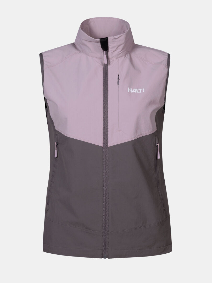 Die Halti Pallas Evo X-stretch Weste Damen ist ärmellos, atmungsaktiv, mit einem hohen Kragen und Reißverschlusstaschen.