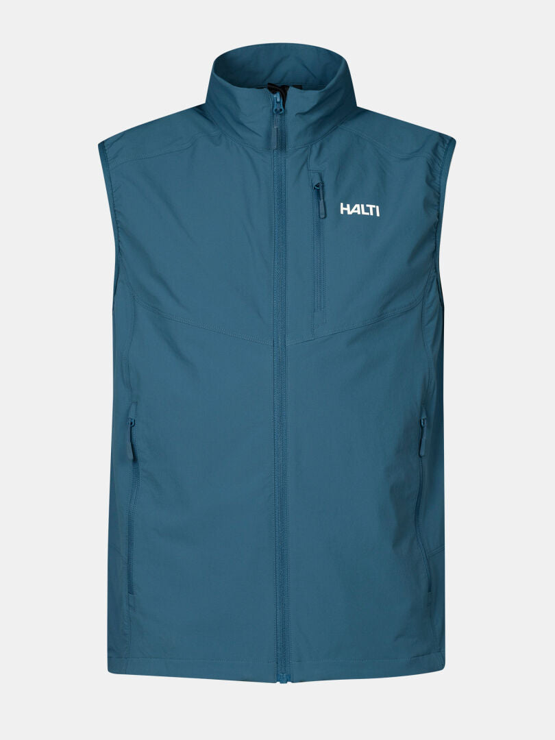 Die Halti Pallas Evo X-stretch Weste Herren ist eine blaue ultraleichte Herrenweste mit hohem Kragen und Reißverschluss vorne.