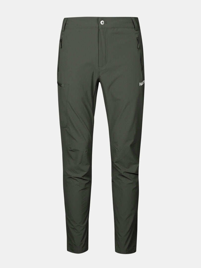 Halti Pallas X-stretch Hose Herren: Dunkelgraue, schmal geschnittene, atmungsaktive Outdoorhose mit Reißverschlusstaschen und Active-Material.