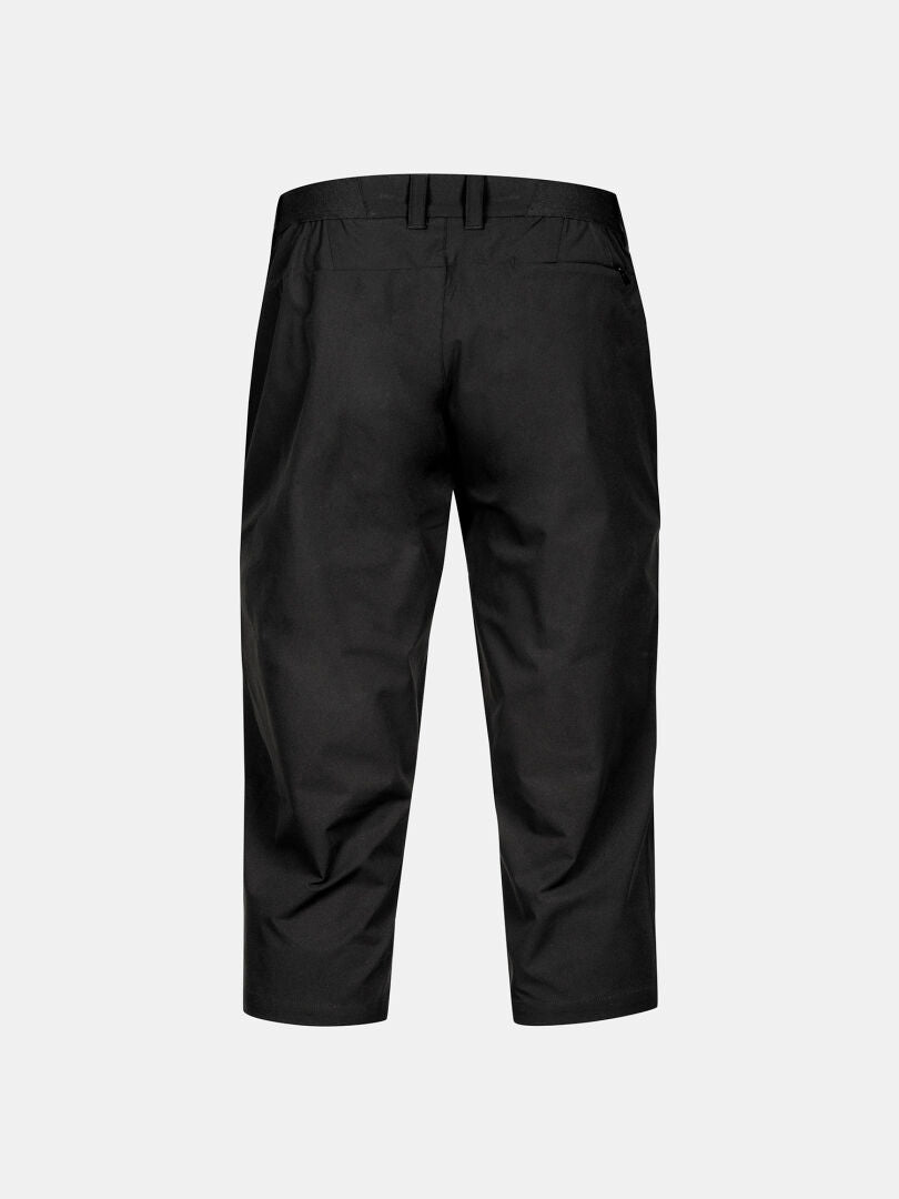 Halti Drive X-stretch Caprihose Damen von hinten auf hellgrau abgebildet; wasserabweisend & UPF 50+.