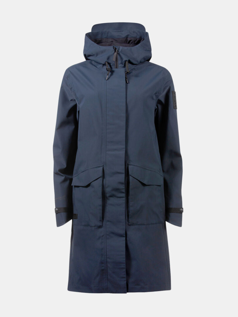 Die Halti Tokoi II DX Parkajacke Damen ist ein marineblauer, wasserdichter City-Parka mit Pattentaschen und geknöpften Manschetten.