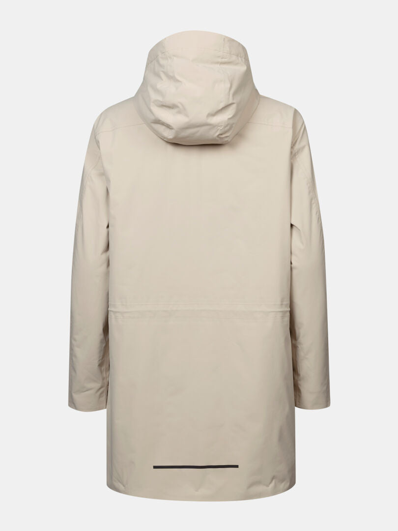 Der Halti Kortteli DX Insulated Parka für Damen in Beige mit Kapuze und Wetterschutz-Funktionen vor weißem Hintergrund.