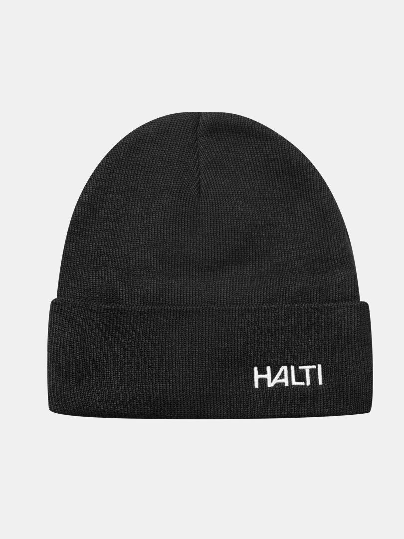 Halti Justie Mütze: Schwarze Strickmütze mit Fleecefutter für zusätzliche Wärme, ideal für Outdoor-Aktivitäten. Hellgrauer Hintergrund.