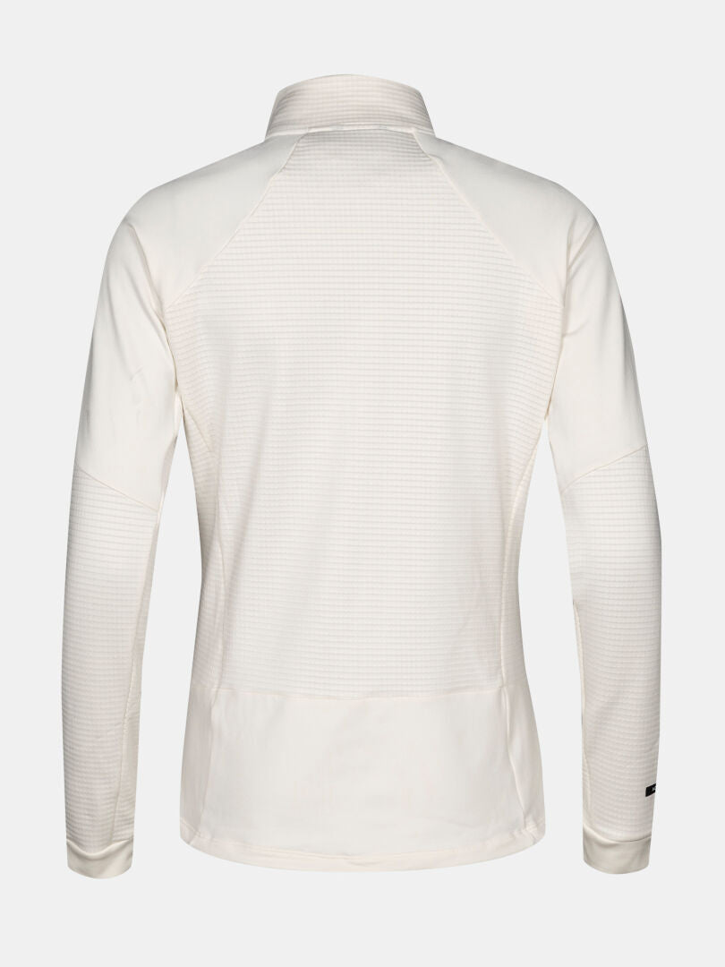 Die Halti HeatGrid Midlayer Jacke Damen, ein cremefarbenes Longsleeve aus recyceltem Polyester, wird von hinten gezeigt.