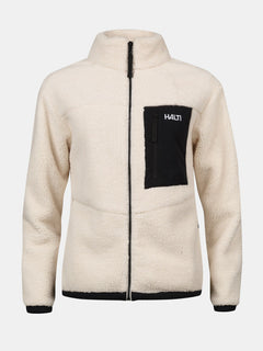 Cremefarbene Halti Lumista Polar Fleece Jacke Damen mit schwarzer Reißverschlusstasche und Logo, abgebildet auf einem unifarbenen Hintergrund.