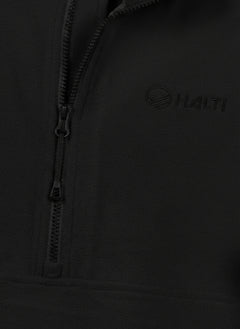 Nahaufnahme des Ossia Fleece-Shirts für Damen von Halti in Schwarz mit Reißverschluss, ideal für Outdoor-Aktivitäten.