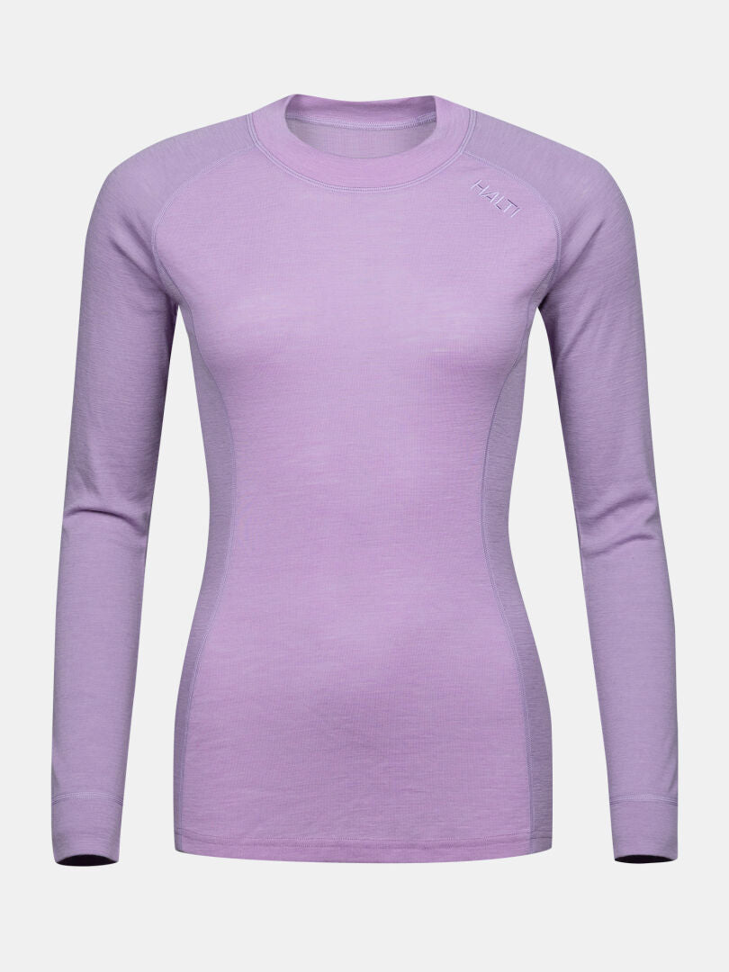 Halti Hossa II Merino Damen-Baselayer: figurbetontes, langärmeliges Shirt in Lavendel mit Rundhalsausschnitt und dezentem Logo auf der linken Schulter.